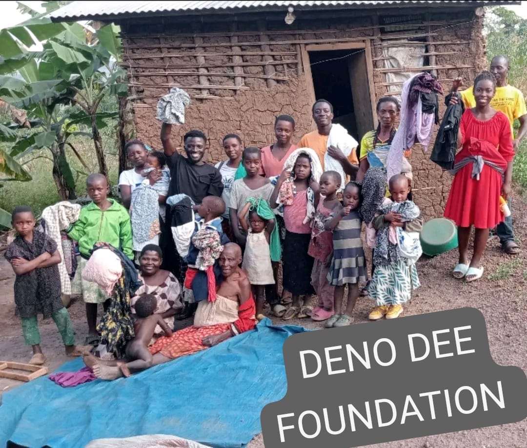 DENO DEE FOUNDATION team with a family and children outside their home after a clothing donation